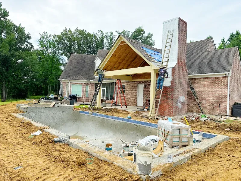 Photo os forming the swimming pool shape and gunite pour.