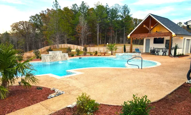 Mountain lake style custom swimming pool.